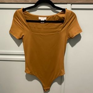 Brown house of Harlow body suit